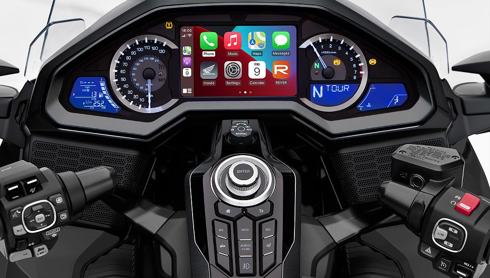 A close-up of the Honda Gold Wing's dash and tank console.