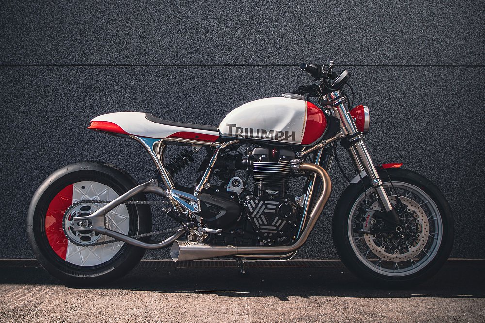 left side view of the red and white custom Speed Twin