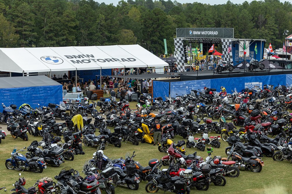 overhead view of the BMW pavilions and display tents and hundreds of parked motorcycles